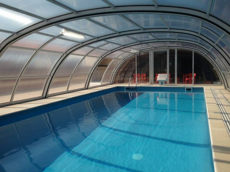 How indoor pool covers improve energy efficiency and water retention